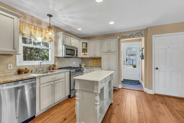 Chandelier, Interior, Kitchen, Pendant Lights, Recessed Lighting, Stainless Steel Appliances, Wood Texture Flooring