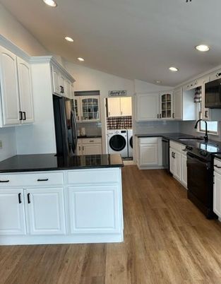 Interior, Kitchen, Recessed Lighting, Washer, Wood Texture Flooring
