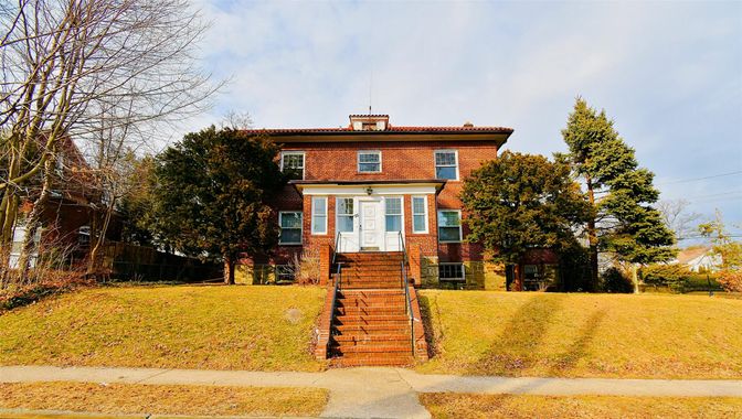 Exterior, Facade, Brick Facade, American Foursquare