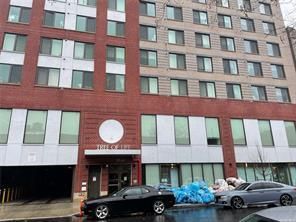 Exterior, Facade, Brick Facade, Condo Building