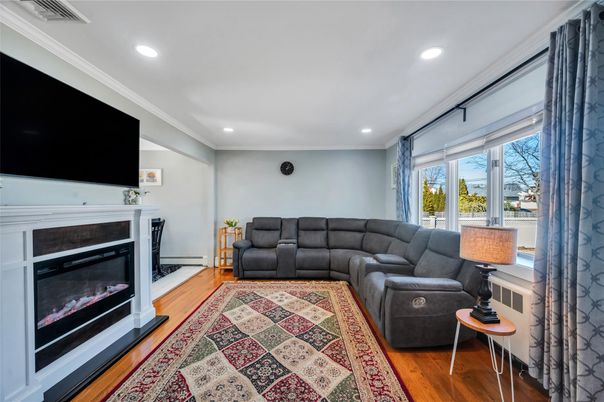 Fireplace, Interior, Living room, Recessed Lighting, Wood Texture Flooring