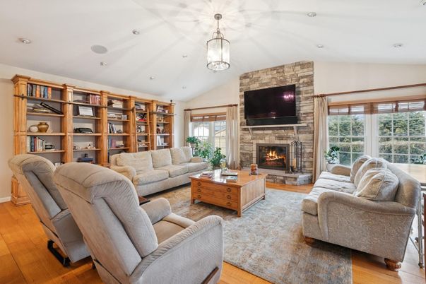 Fireplace, Interior, Living room, Pendant Lights, Recessed Lighting, Stone Walls, Wood Texture Flooring