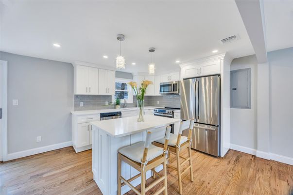 Interior, Kitchen, Pendant Lights, Recessed Lighting, Stainless Steel Appliances, Wood Texture Flooring