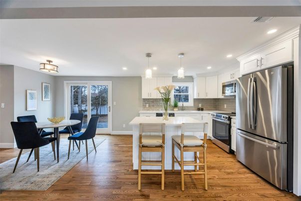 Dining room, Interior, Kitchen, Pendant Lights, Recessed Lighting, Stainless Steel Appliances, Wood Texture Flooring