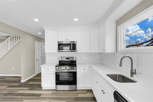 Interior, Kitchen, Recessed Lighting, Stainless Steel Appliances, Wood Texture Flooring