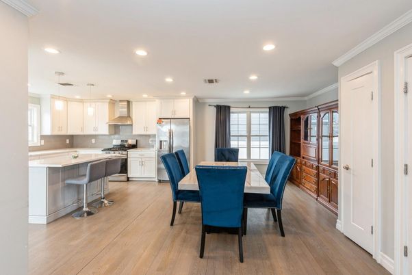 Dining room, Interior, Kitchen, Pendant Lights, Recessed Lighting, Stainless Steel Appliances, Wood Texture Flooring