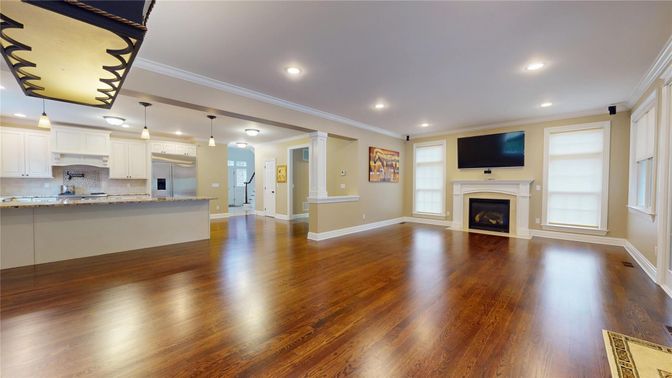 Empty room, Fireplace, Interior, Kitchen, Pendant Lights, Recessed Lighting, Wood Texture Flooring