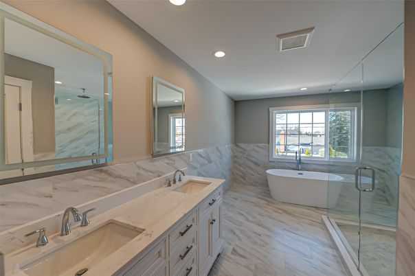 Bathroom, Dual Sink Vanities, Free Standing Baths, Glass Shower, Interior, Marble, Marble Walls, Recessed Lighting