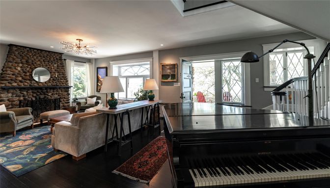 Fireplace, Interior, Living room, Piano, Recessed Lighting, Stone Walls, Wood Texture Flooring