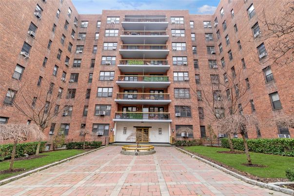 Exterior, Facade, Brick Facade, Condo Building