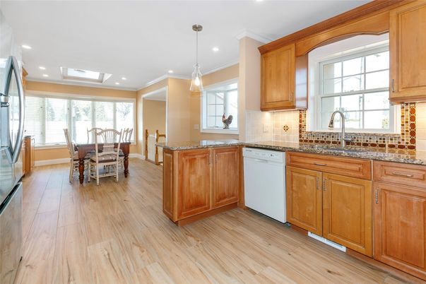Dining room, Interior, Kitchen, Pendant Lights, Recessed Lighting, Stainless Steel Appliances, Wood Texture Flooring