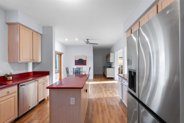 Dining room, Interior, Kitchen, Recessed Lighting, Stainless Steel Appliances, Wood Texture Flooring