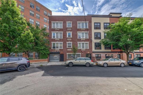 Exterior, Facade, Brick Facade, Condo Building