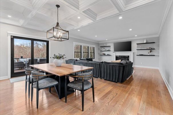 Dining room, Fireplace, Interior, Living room, Pendant Lights, Recessed Lighting, Wood Texture Flooring