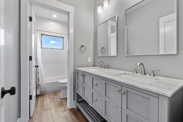 Bathroom, Dual Sink Vanities, Interior, Recessed Lighting, Wood Texture Flooring