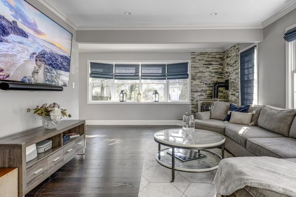 Fireplace, Interior, Living room, Recessed Lighting, Stone Walls, Wood Texture Flooring