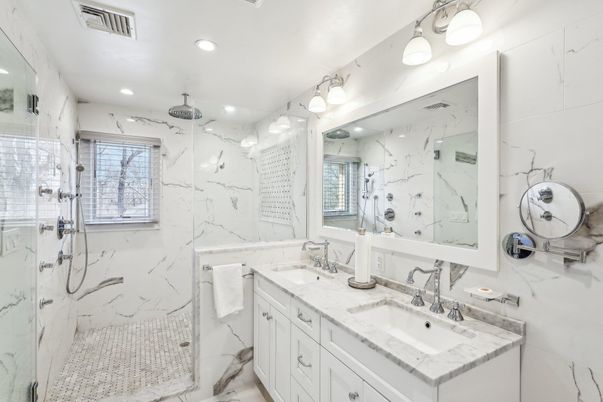 Bathroom, Dual Sink Vanities, Glass Shower, Interior, Marble, Marble Walls, Recessed Lighting