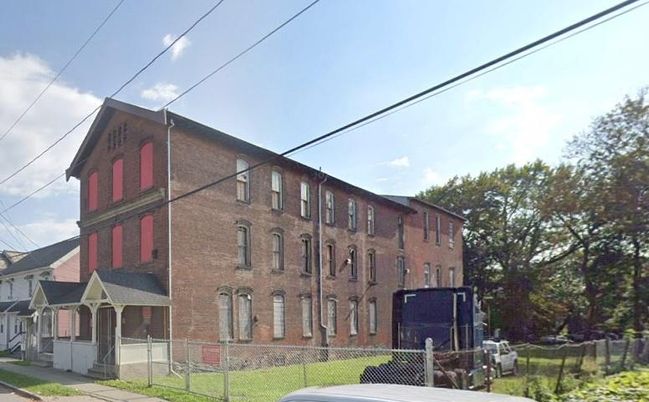 Exterior, Facade, Brick Facade, Condo Building