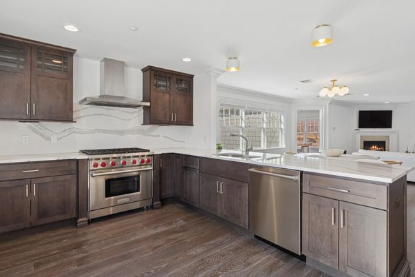 Fireplace, Interior, Kitchen, Recessed Lighting, Stainless Steel Appliances, Wood Texture Flooring