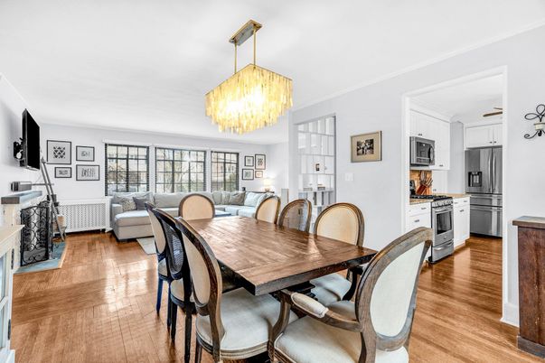 Chandelier, Dining room, Interior, Kitchen, Living room, Stainless Steel Appliances, Wood Texture Flooring