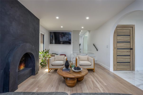 Fireplace, Interior, Living room, Marble, Recessed Lighting, Wood Texture Flooring