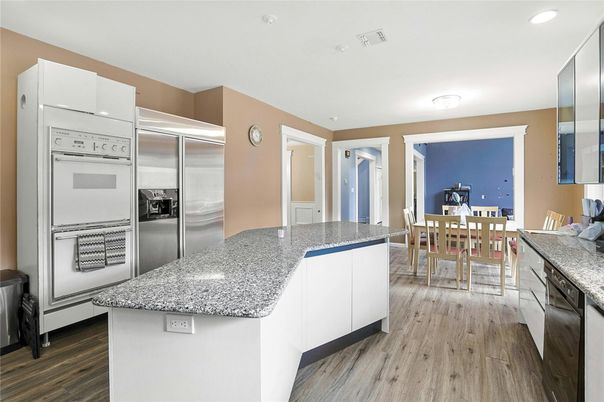 Dining room, Interior, Kitchen, Recessed Lighting, Stainless Steel Appliances, Wood Texture Flooring