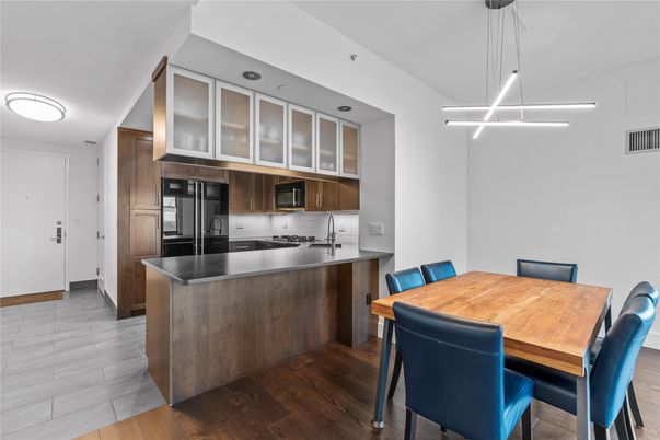 Dining room, Interior, Kitchen, Pendant Lights, Stainless Steel Appliances, Wood Texture Flooring