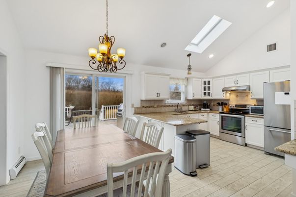 Chandelier, Dining room, Interior, Kitchen, Recessed Lighting, Stainless Steel Appliances, Wood Texture Flooring