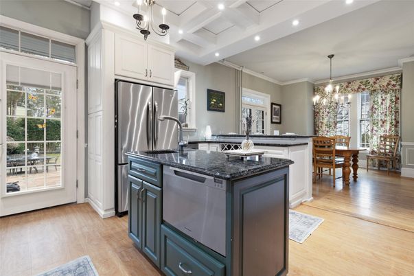 Chandelier, Dining room, Interior, Kitchen, Pendant Lights, Recessed Lighting, Stainless Steel Appliances, Wood Texture Flooring
