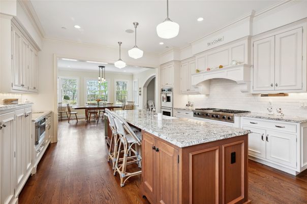 Chandelier, Dining room, Interior, Kitchen, Pendant Lights, Recessed Lighting, Stainless Steel Appliances, Wood Texture Flooring