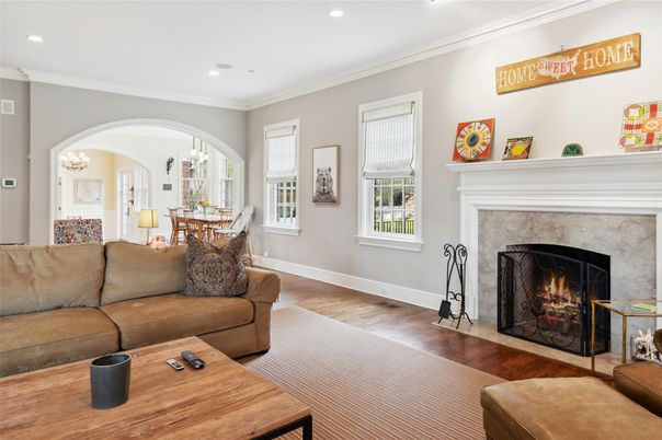 Dining room, Fireplace, Interior, Living room, Recessed Lighting, Wood Texture Flooring