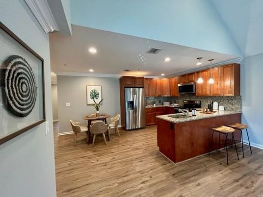 Dining room, Interior, Kitchen, Pendant Lights, Recessed Lighting, Stainless Steel Appliances, Wood Texture Flooring