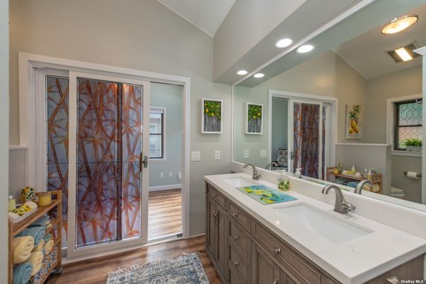 Bathroom, Dual Sink Vanities, Interior, Recessed Lighting, Wood Texture Flooring