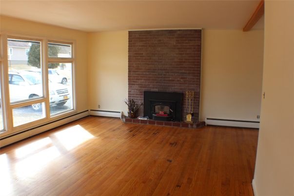 Empty room, Fireplace, Interior, Stone Walls, Wood Texture Flooring