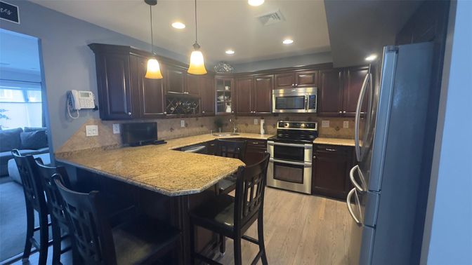 Interior, Kitchen, Pendant Lights, Recessed Lighting, Stainless Steel Appliances, Wood Texture Flooring