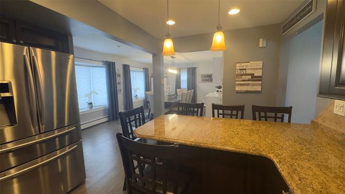 Dining room, Interior, Kitchen, Pendant Lights, Recessed Lighting, Stainless Steel Appliances, Wood Texture Flooring