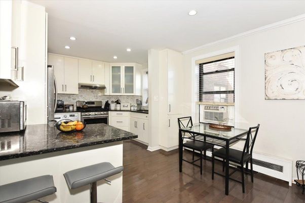 Dining room, Interior, Kitchen, Recessed Lighting, Stainless Steel Appliances, Wood Texture Flooring