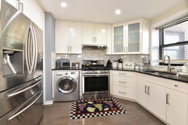 Interior, Kitchen, Recessed Lighting, Stainless Steel Appliances, Washer, Wood Texture Flooring
