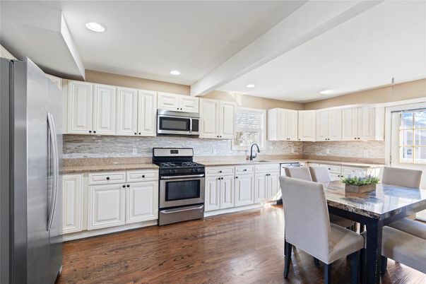 Dining room, Interior, Kitchen, Recessed Lighting, Stainless Steel Appliances, Wood Texture Flooring
