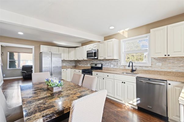 Dining room, Interior, Kitchen, Recessed Lighting, Stainless Steel Appliances, Wood Texture Flooring