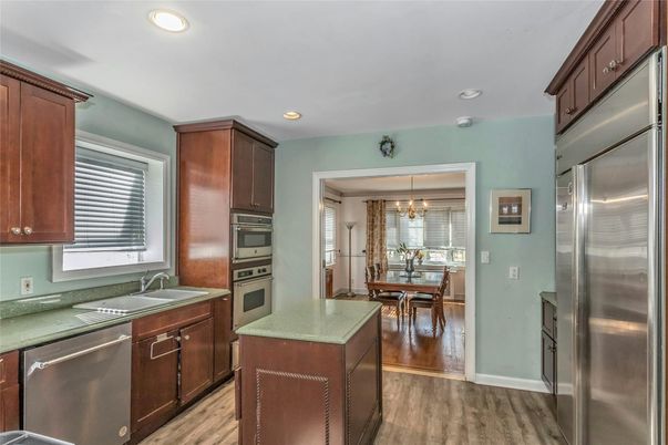 Chandelier, Dining room, Interior, Kitchen, Recessed Lighting, Stainless Steel Appliances, Wood Texture Flooring