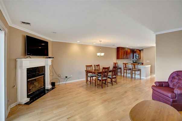 Chandelier, Dining room, Fireplace, Interior, Kitchen, Pendant Lights, Recessed Lighting, Wood Texture Flooring