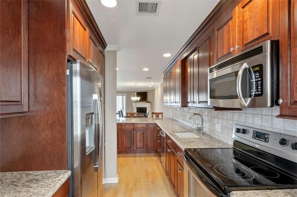 Interior, Kitchen, Recessed Lighting, Stainless Steel Appliances, Wood Texture Flooring