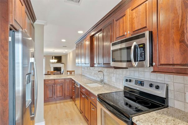 Interior, Kitchen, Pendant Lights, Recessed Lighting, Stainless Steel Appliances, Wood Texture Flooring
