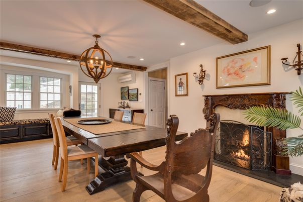 Chandelier, Dining room, Fireplace, Interior, Recessed Lighting, Wooden Beams, Wood Texture Flooring