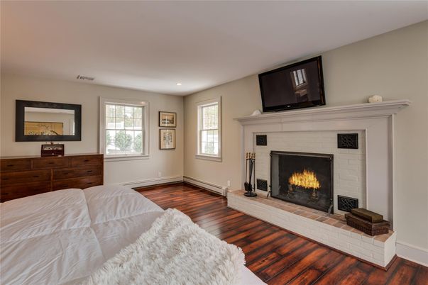 Bedroom, Fireplace, Interior, Recessed Lighting, Wood Texture Flooring