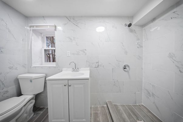 Bathroom, Interior, Marble Walls, Recessed Lighting, Wood Texture Flooring
