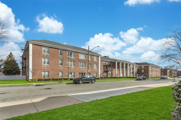 Exterior, Facade, Brick Facade, Condo Building