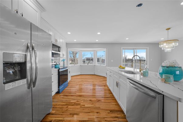 Chandelier, Interior, Kitchen, Recessed Lighting, Stainless Steel Appliances, Wood Texture Flooring