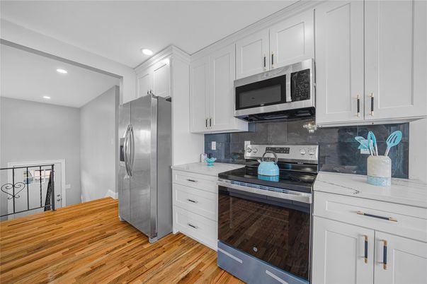 Interior, Kitchen, Recessed Lighting, Stainless Steel Appliances, Wood Texture Flooring